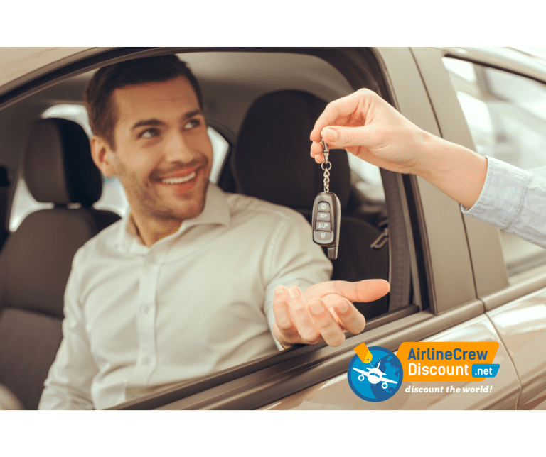 man in car receiving rental car Alamo keys